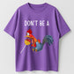 Don't Be a Funny Rooster Lollipop Graphic T-Shirt - Sarcastic Humor Chicken Pun Tee